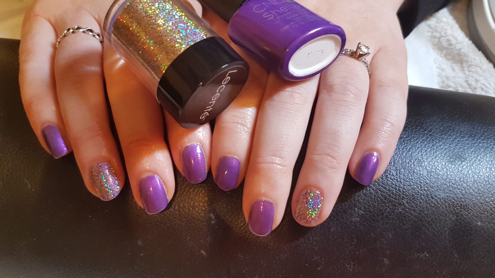 Purple nail colour with glitter accent nails
